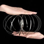 Twist & Flow - Magiskt armband som kryper längs armen